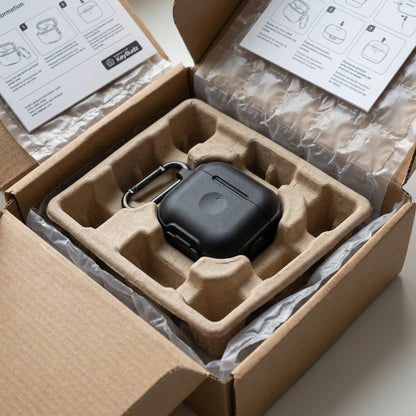 Packaging shot of the specific KeyBudz ElementProof AirPods 4 case inside protective shipping layers.